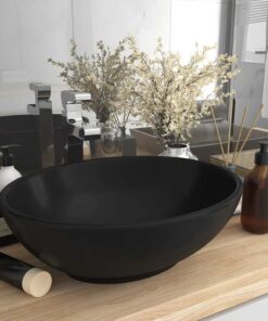 vidaXL Wastafel ovaal 40x33 cm keramiek matzwart