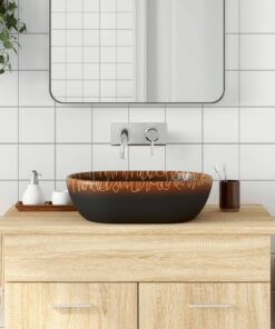 vidaXL Opzetwasbak ovaal 47x33x13 cm keramiek zwart en oranje